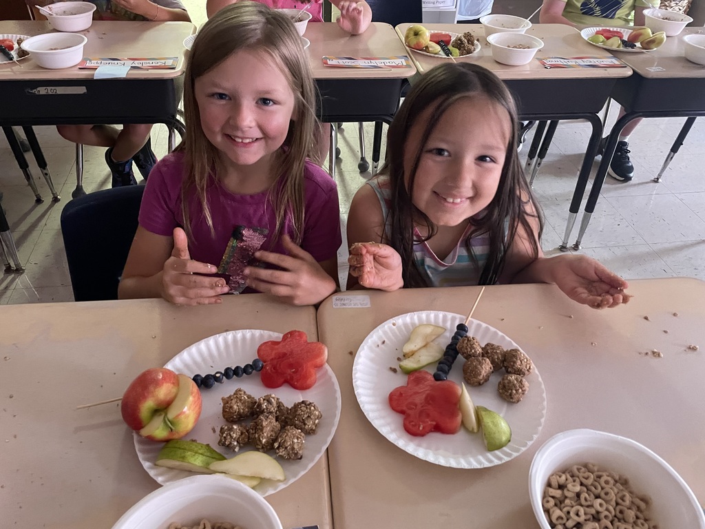 Smiling friends sharing healthy treats