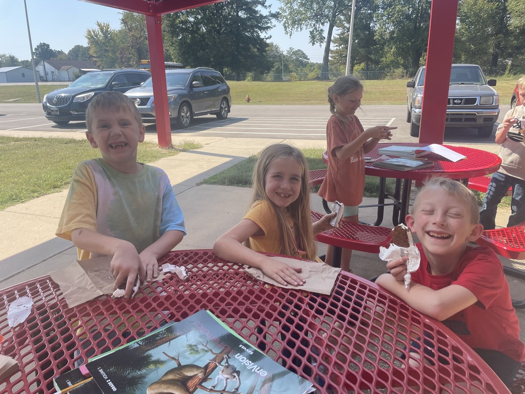 Students enjoying ice cream at the outdoor classroom 2 